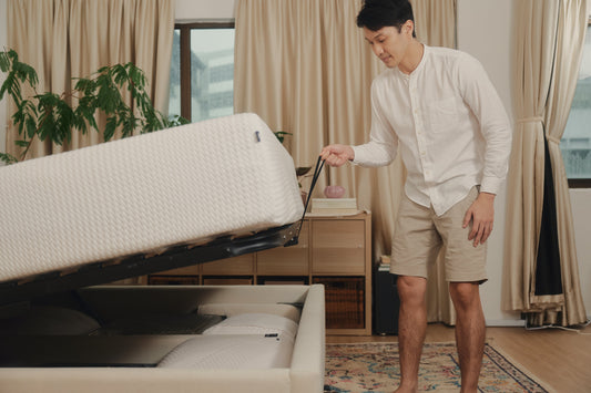 Man opening woosa storage bed